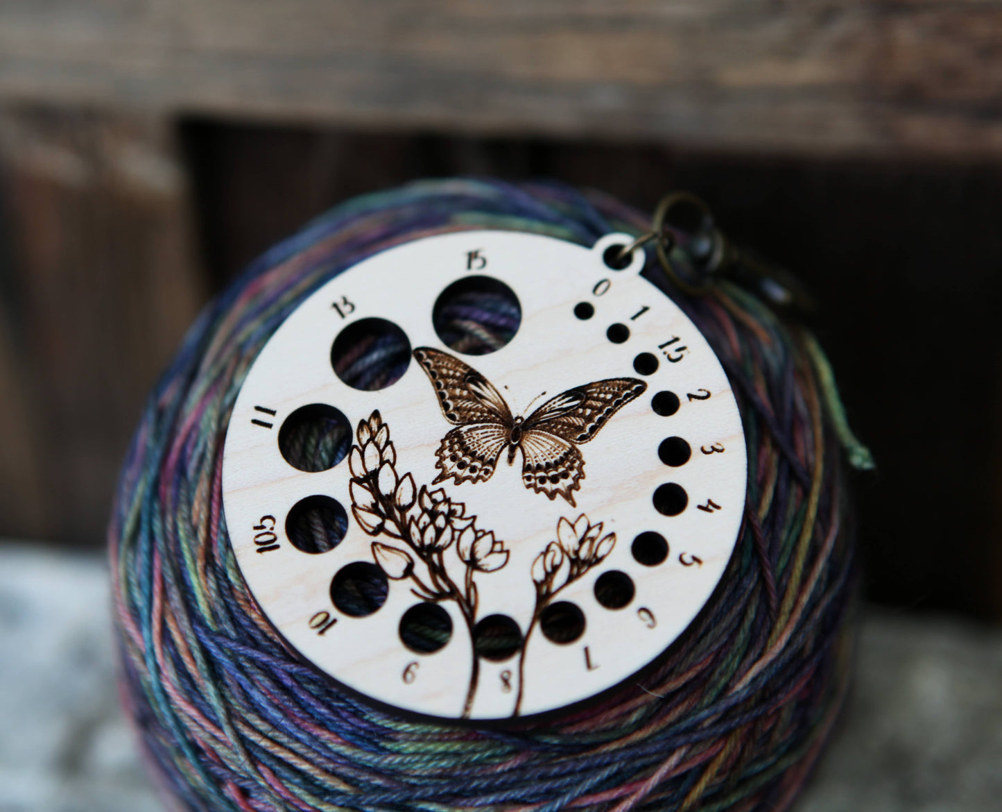 Butterfly with Flower Needle Gauge with Bronze Clasp