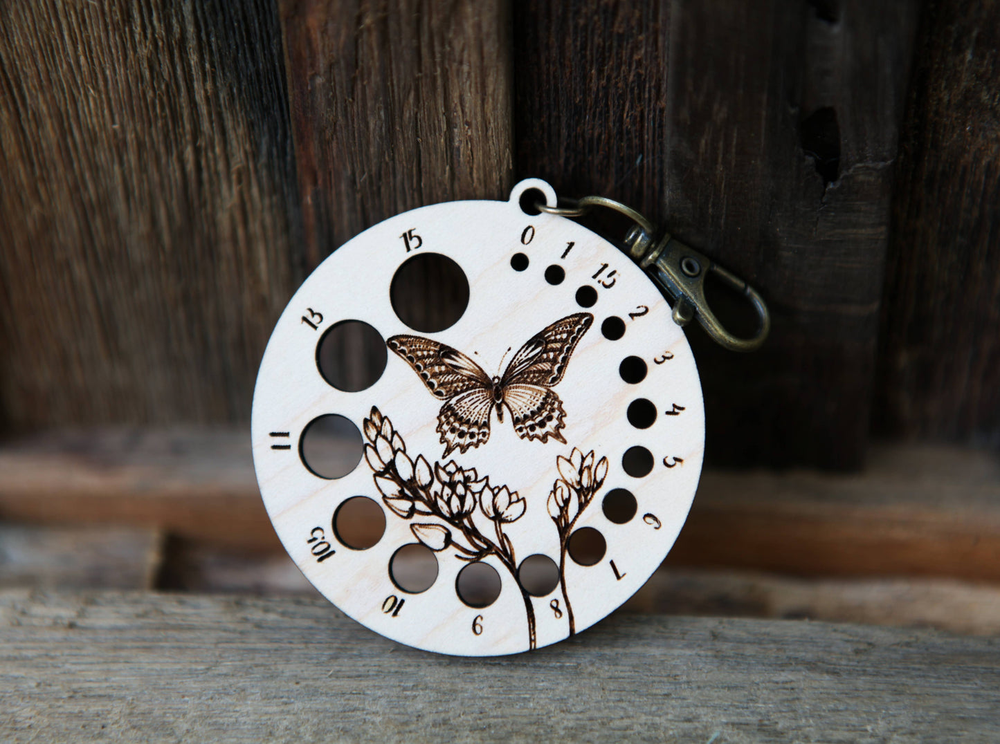 Butterfly with Flower Needle Gauge with Bronze Clasp