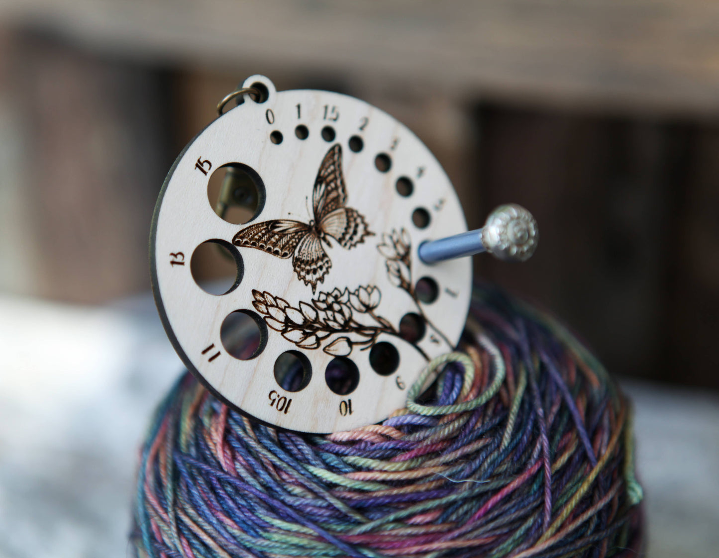 Butterfly with Flower Needle Gauge with Bronze Clasp