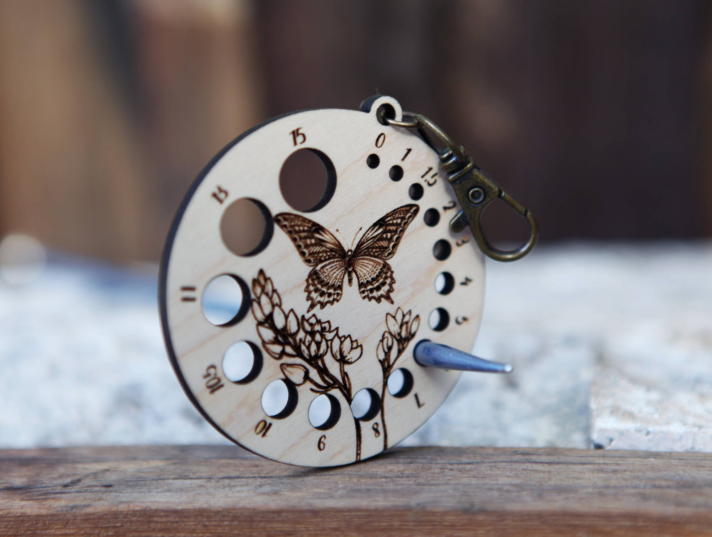 Butterfly with Flower Needle Gauge with Bronze Clasp