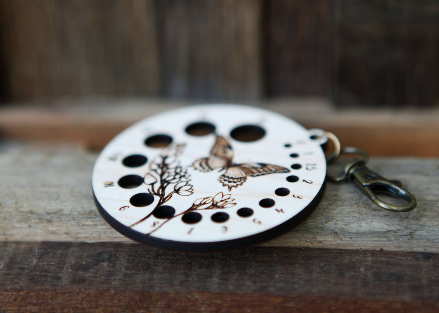 Butterfly with Flower Needle Gauge with Bronze Clasp