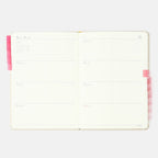 Hightide See-Through Index Stickers, pink, on the edge of a planner
